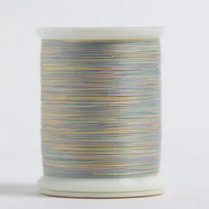 Spool of pastel multicolored sewing thread