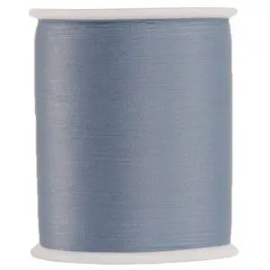 Spool of light blue sewing thread
